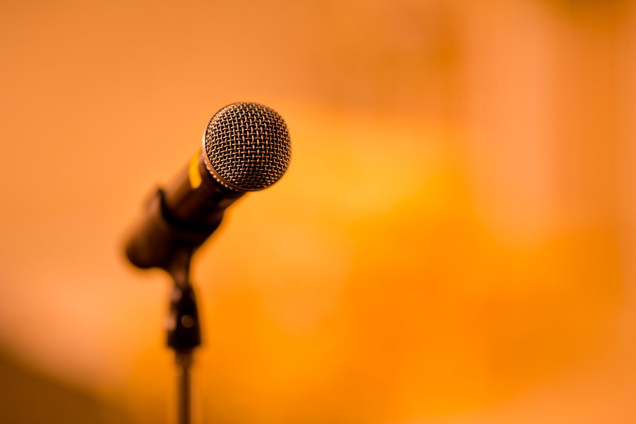 microphone on stage, speaker, conference